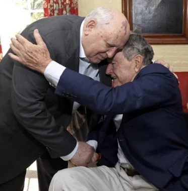 	 Former President of the Soviet Union Mikhail Gorbachev, left, is greeted by former President George H.W. Bush, right, as the two meet for lunch Thursday, Nov. 1, 2012, in Houston. © AP