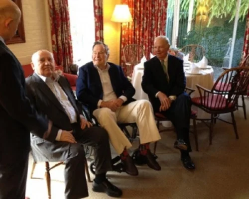 	 Left to right: Pavel Palazhchenko, interpreter, former President of the Soviet Union Mikhail Gorbachev, former President George H.W. Bush, former Secretary of State James Baker. © AP.
