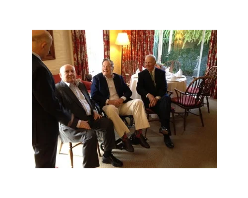 	 Left to right: Pavel Palazhchenko, interpreter, former President of the Soviet Union Mikhail Gorbachev, former President George H.W. Bush, former Secretary of State James Baker. © AP.