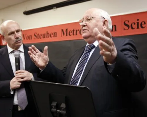 Former Russian President Gorbachev, with his interpreter, speaks with students at Frederick Von Steuben Metropolitan Science Center in Chicago. Apr 23, 2012.Photo By JEFF HAYNES/REUTERS