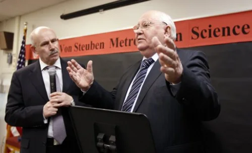 Former Russian President Gorbachev, with his interpreter, speaks with students at Frederick Von Steuben Metropolitan Science Center in Chicago. Apr 23, 2012.Photo By JEFF HAYNES/REUTERS