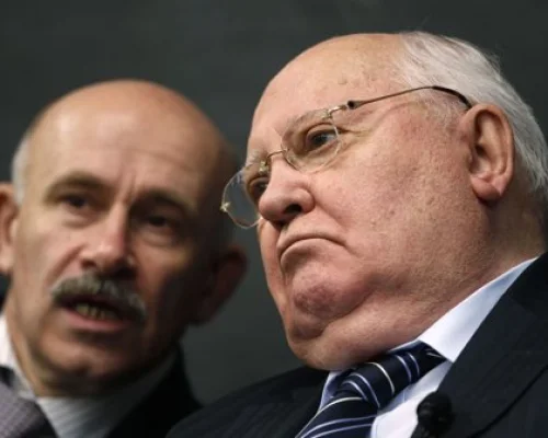 	 Former Soviet leader Gorbachev and his interpreter listen to a question from students in Chicago. Apr 23, 2012. Photo By JEFF HAYNES/REUTERS